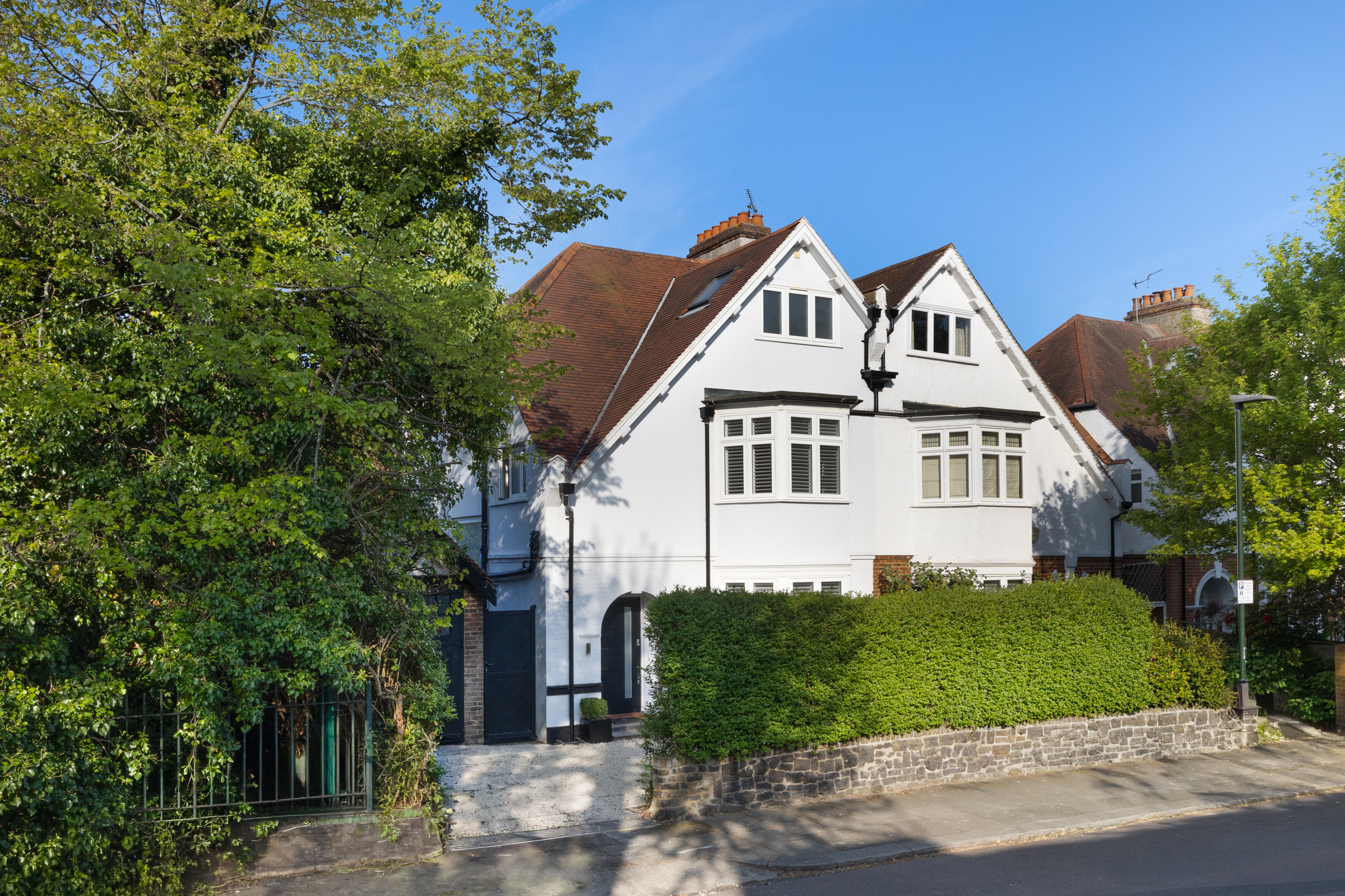 A Semi-Detached House with a Wide Garden and Garage on Kingston Lane