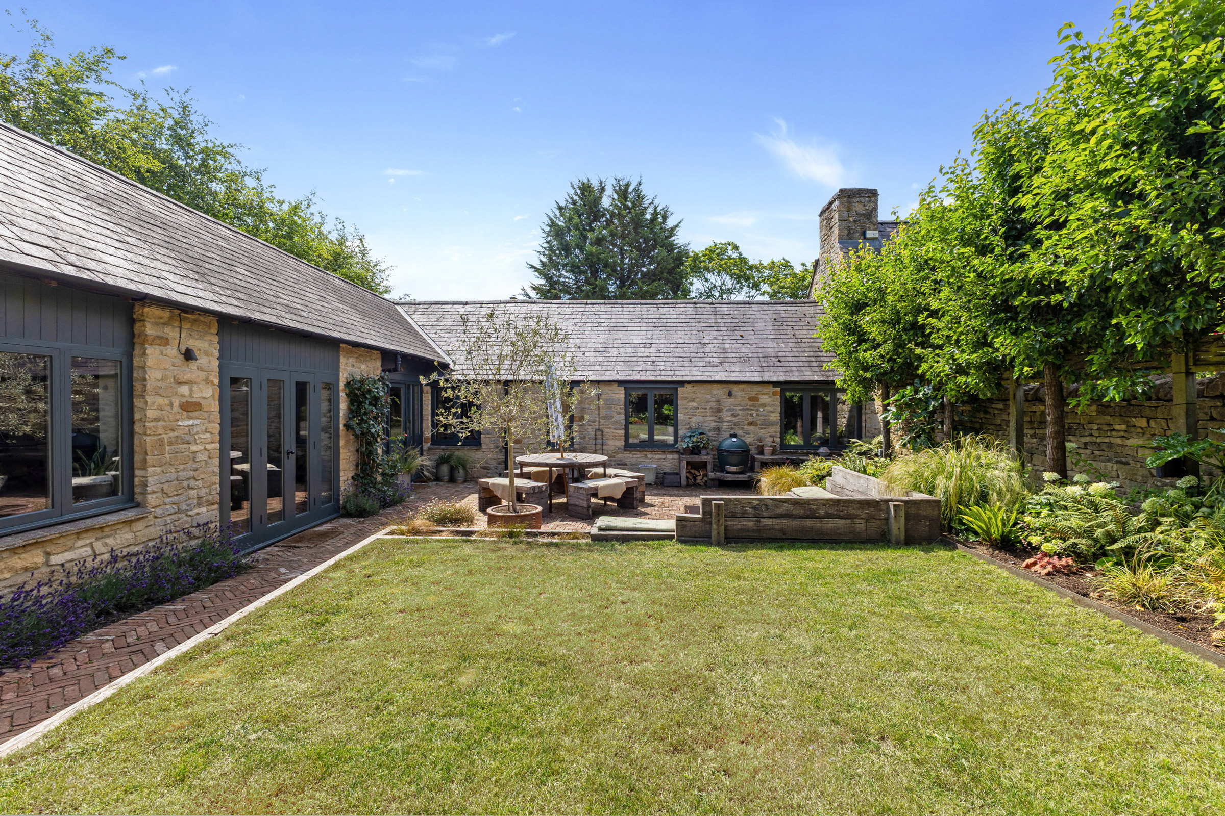A comprehensively renovated Cotswold barn conversion of exceptional quality