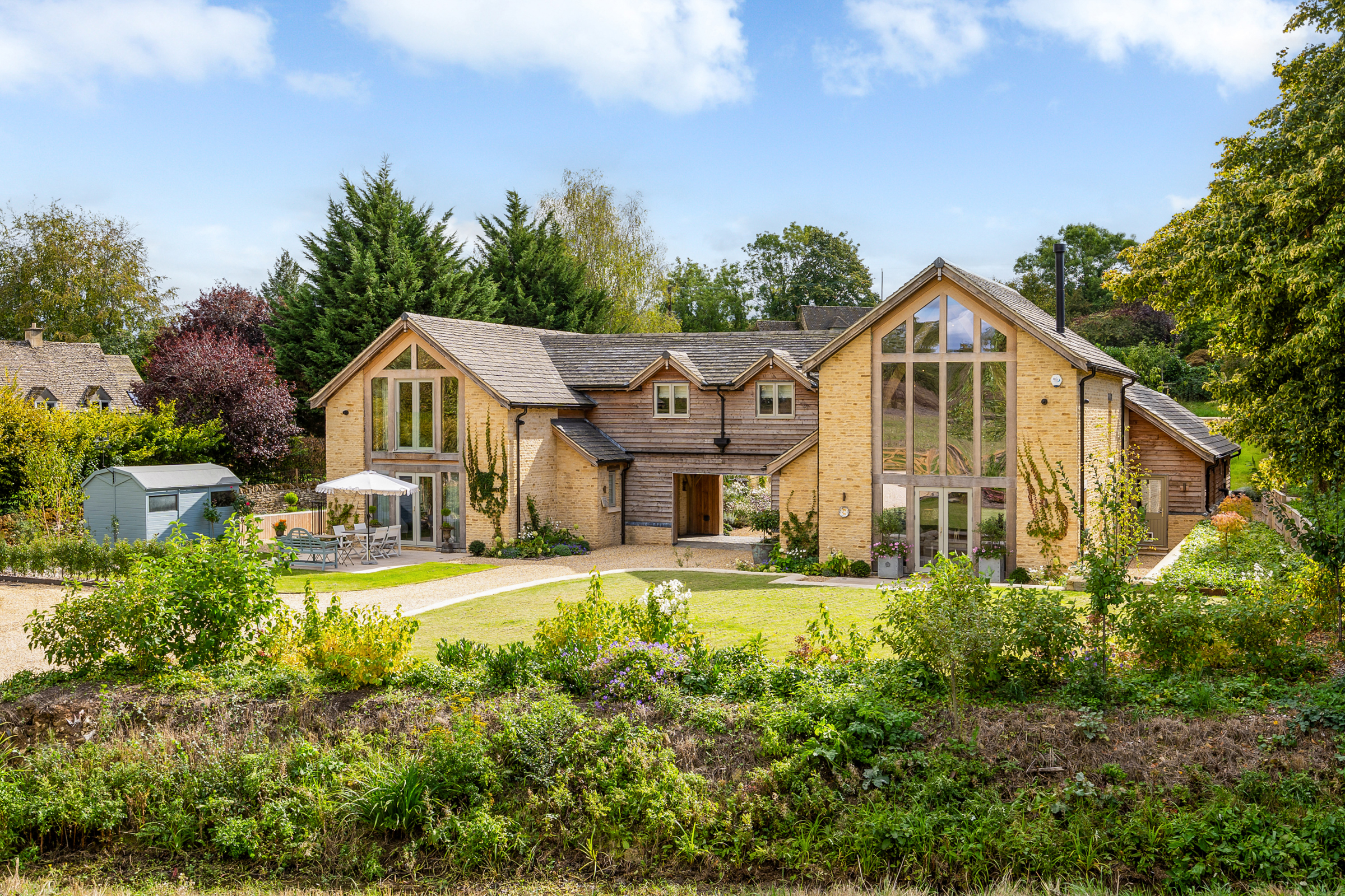 An exceptional contemporary country house with landscaped gardens in Upper Oddin